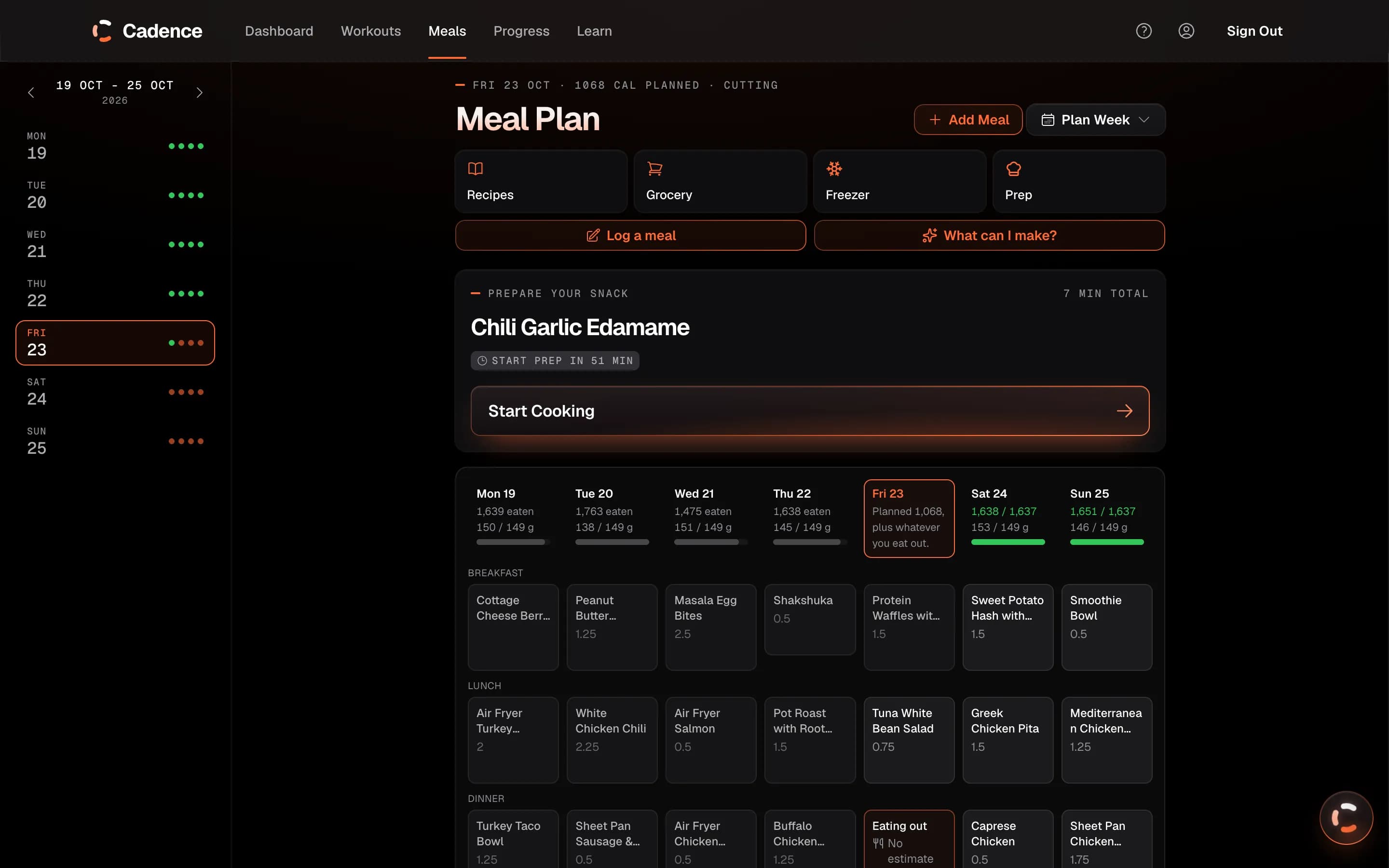 The Meals week planner on the web for 19 to 25 October: a day list on the left, the next meal to prepare (Chili Garlic Edamame), and a week grid of breakfast, lunch and dinner for each day with calories and protein against target. Friday dinner is marked as eating out.